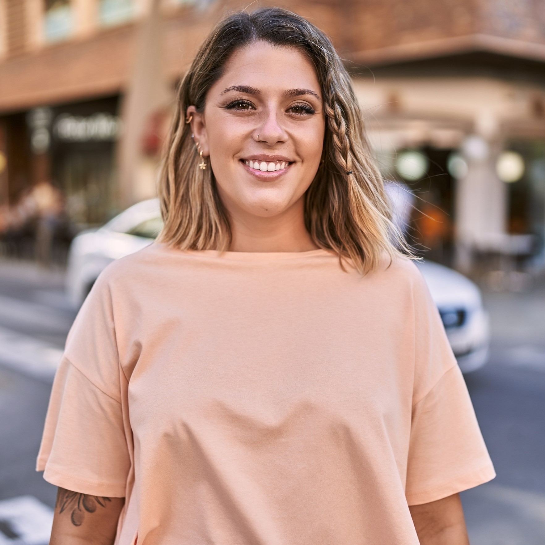 A woman smiling because she knows Your First Look offers Free Ultrasounds in Toledo, Ohio