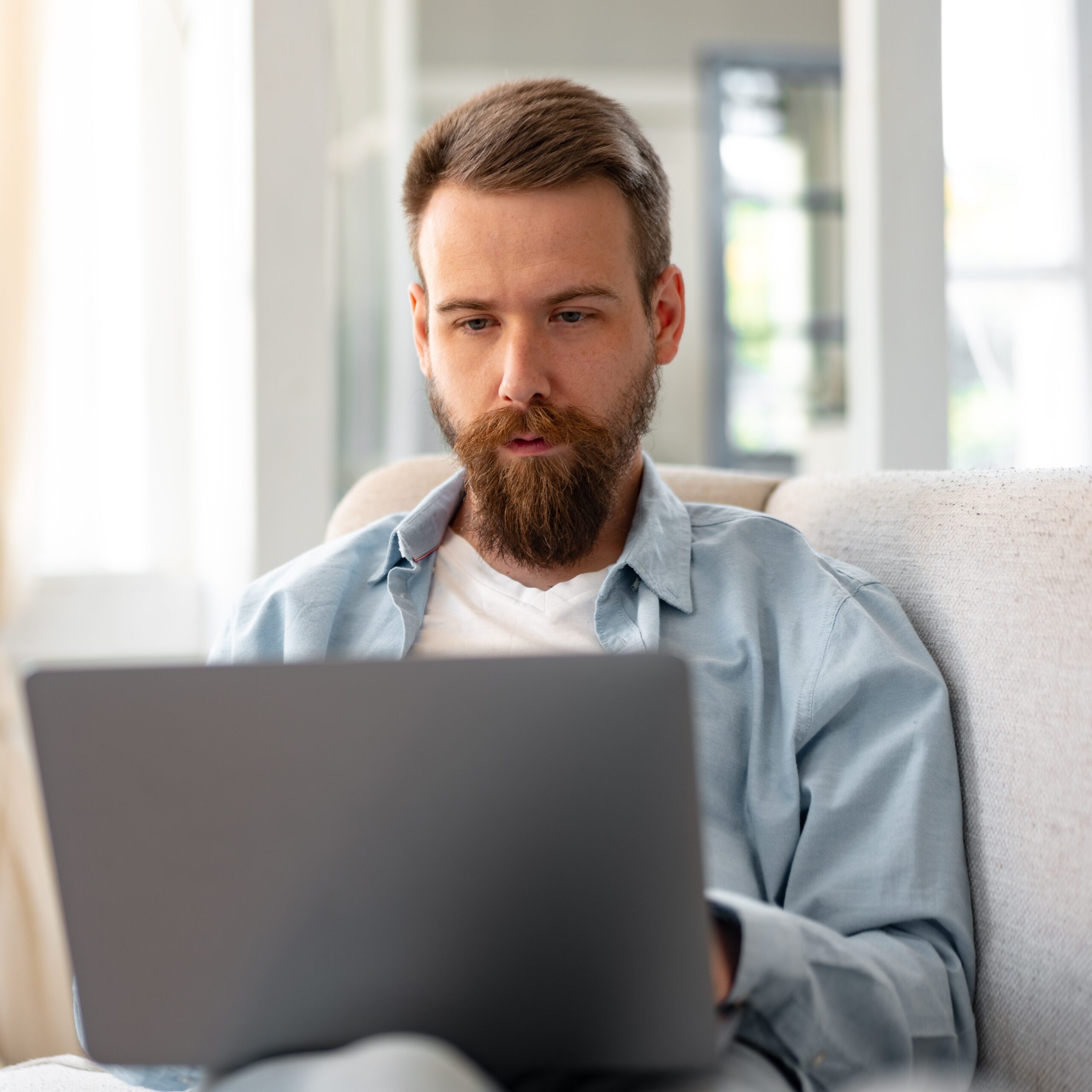 Man searching on her laptop "My Girlfriend is Pregnant… Now What?!"